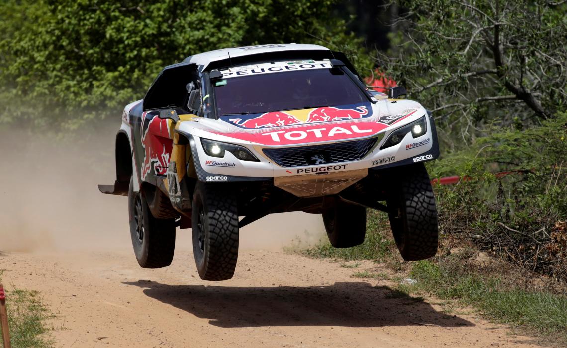 Imagen Loeb, sobre su Peugeot
