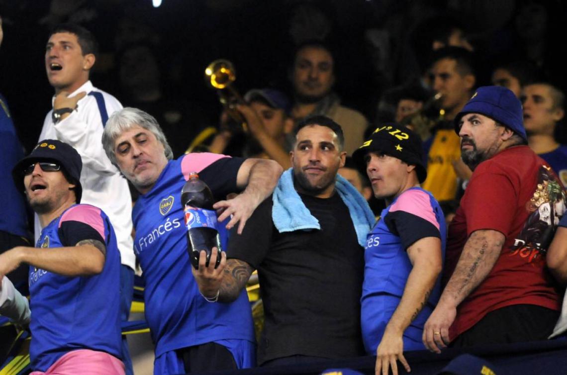 Imagen Di Zeo y Martín, en la tribuna.