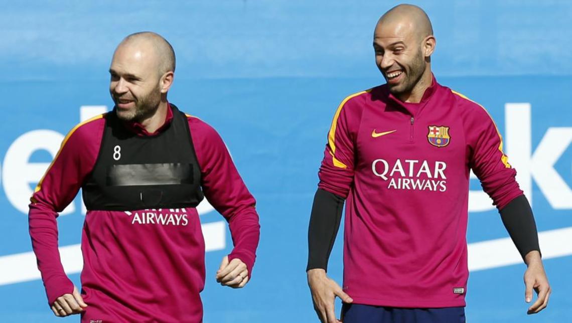 Imagen Iniesta, junto a Masche en una práctica.