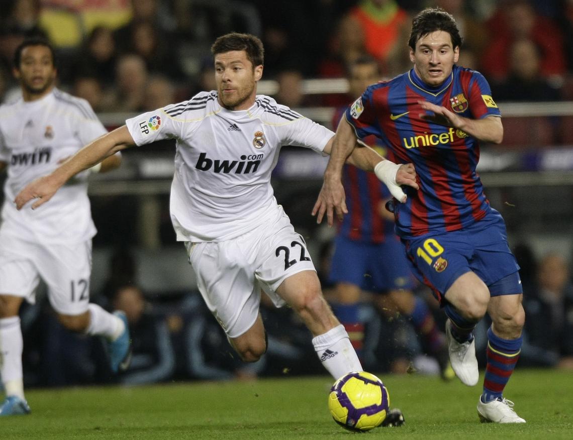 Imagen Xabi, persiguiendo a Messi.