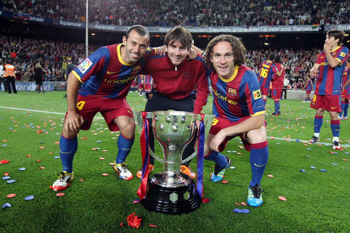 Imagen Celebrando la conquista de la Liga, junto a Messi y Gabriel Milito.