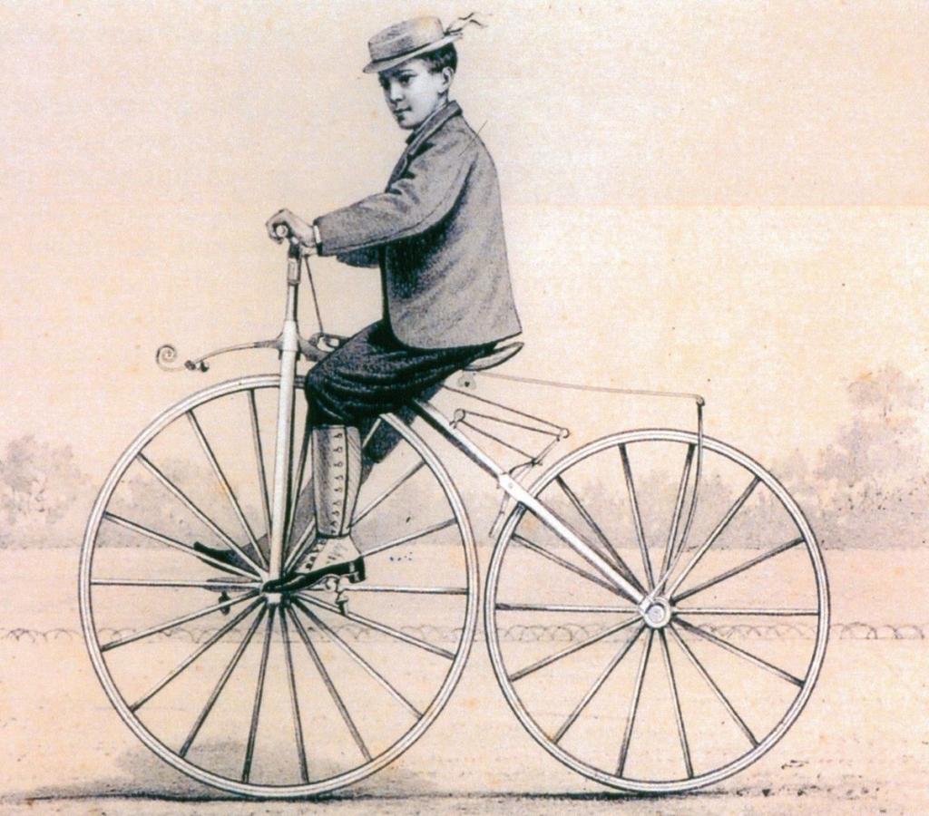 El hijo de Pierre Michaux , Ernest , en un velocipede en 1868.