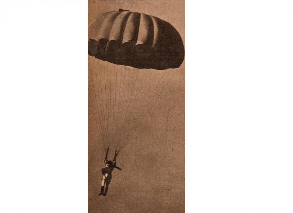Imagen El paracaidista argentino durante un descenso. Ha realizado, desde 1932, alrededor de ciento cincuenta saltos en el espacio. Es un estudioso y observador que domina su especialidad. 