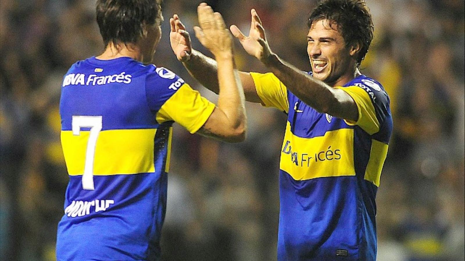Imagen Mouche y Cvitanich, los autores de los goles contra Olimpo en la fecha 1 del Clausura 2012