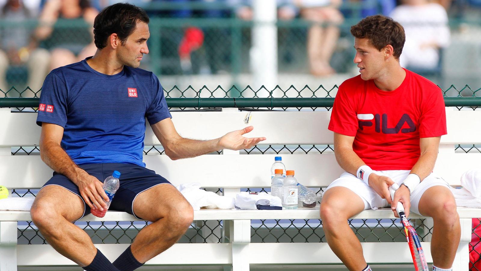 Schwartzman y Federer durante una práctica. Foto: El Gráfico