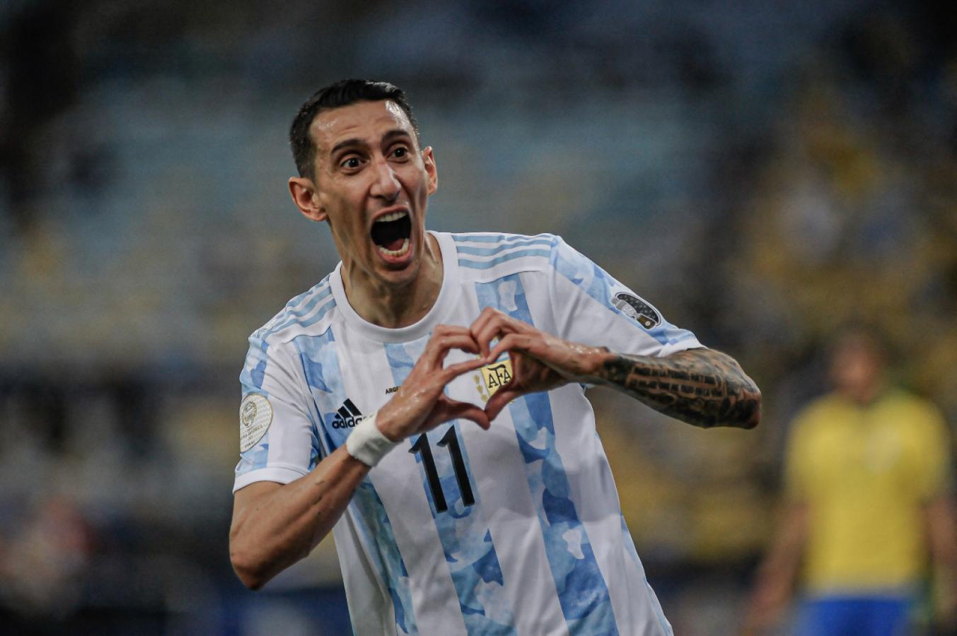 El festejo característico de Di María. Como ante Nigeria marcó el tanto en la final y le dio el título a Argentina.