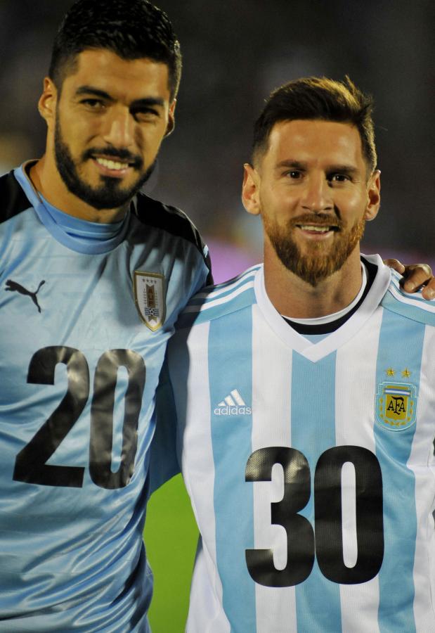 Imagen Messi y Suárez encabezaron la gestión para ser sede en 2030 (DANTE FERNANDEZ / AFP)