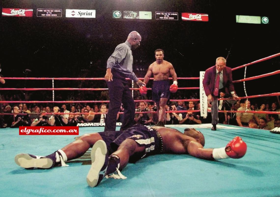 Tyson expectante. Norris desplomado, Steele que interviene. La confusión.