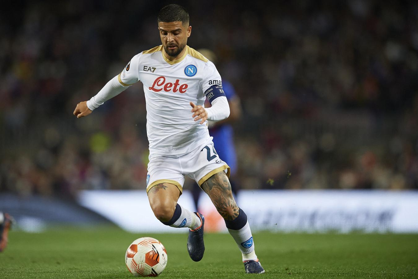 Imagen Insigne, con su tatuaje de Maradona en la pierna izquierda. Foto: AFP