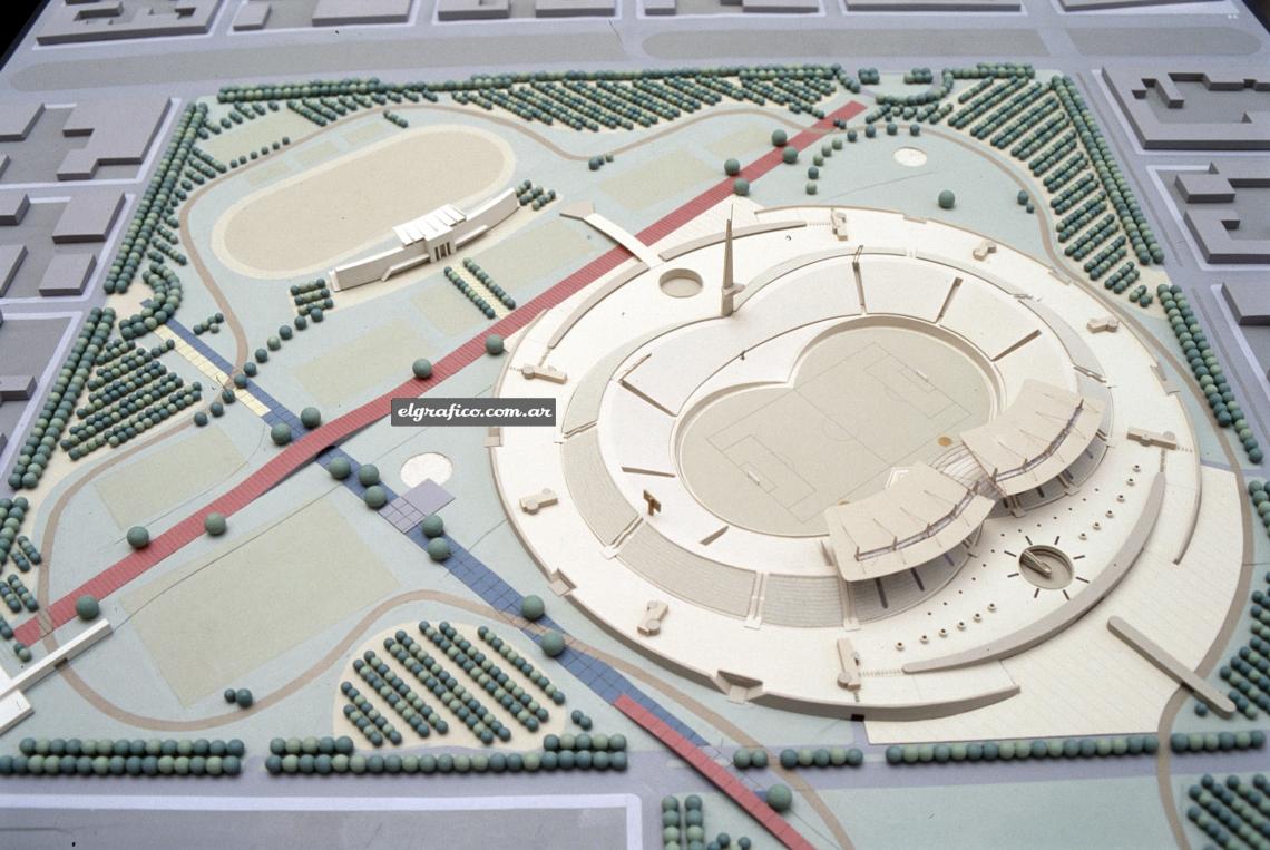 La maqueta del estadio -con su forma particular- y la zona que será parquizada.