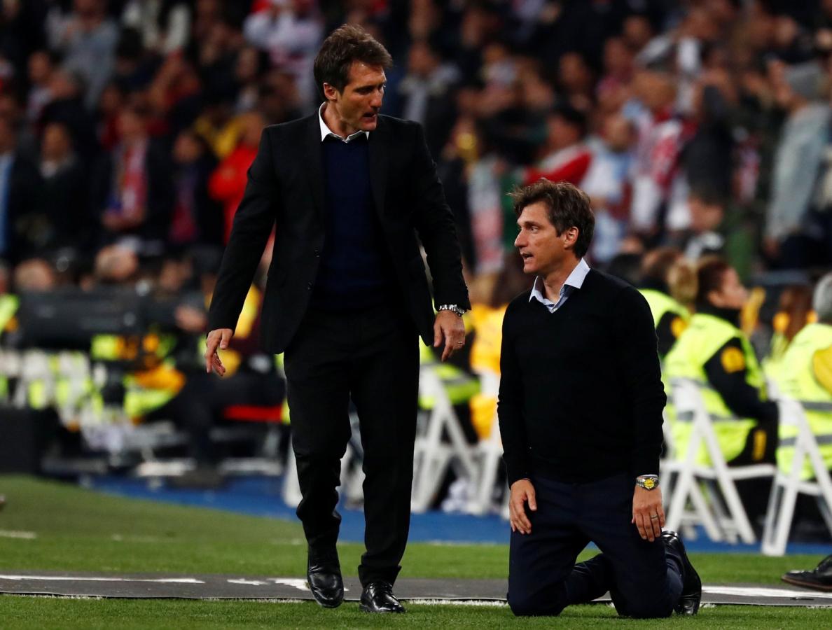 Imagen Los mellizos Barros Schelotto durante la final de Madrid.