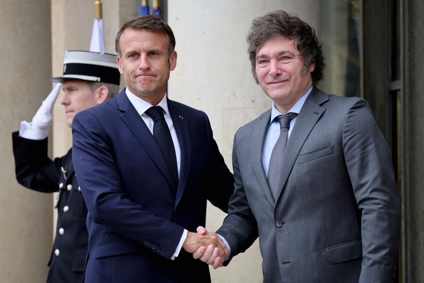 Imagen Javier Milei y Emmanuel Macron, presentes en la inauguración (AFP).