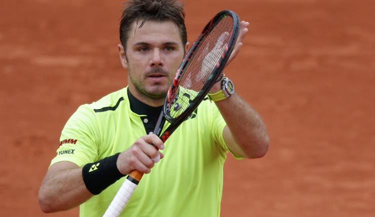 Imagen de Wawrinka no quiso perder tiempo y peloteó con un ball boy