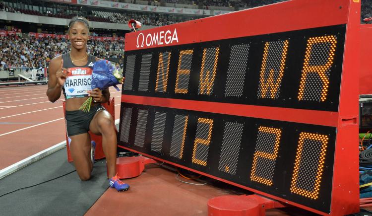 Imagen de Harrison rompe record; Bolt vence en los 200