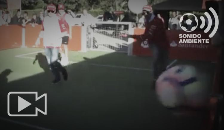 Imagen de Vettel rompe la cámara de un pelotazo